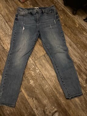 Women's Skinny Jeans in Medium Blue with Distressed Detailing
